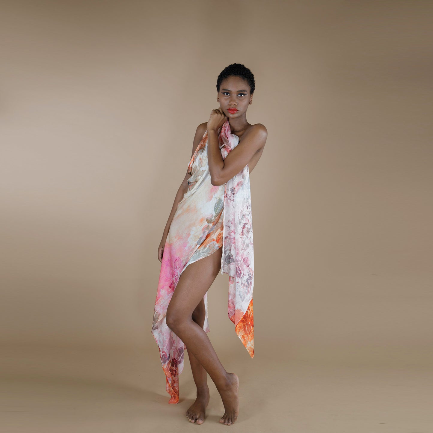 A rectangle scarf made from organic rose petal fabric, printed with non toxic inks. the print is inspired from botanical