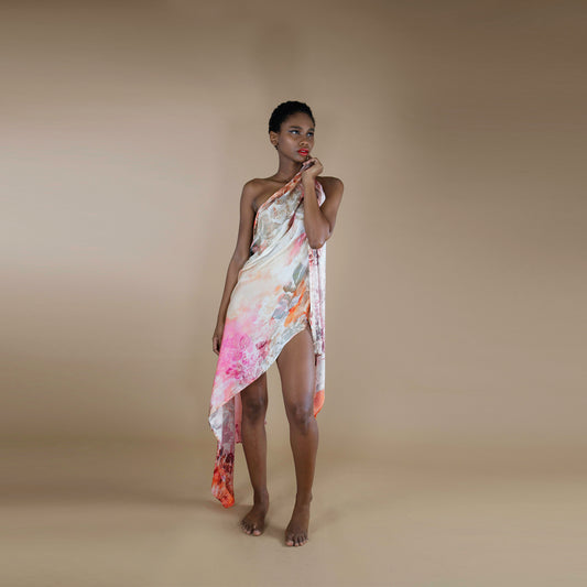 A rectangle scarf made from organic rose petal fabric, printed with non toxic inks. the print is inspired from botanical