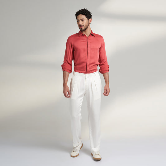 A COMFORT fit trousers in organic lotus stem fabric with 2 front pleats and turn up bottom and one back pocket details. the Trouser is super soft and comfortable to wear.